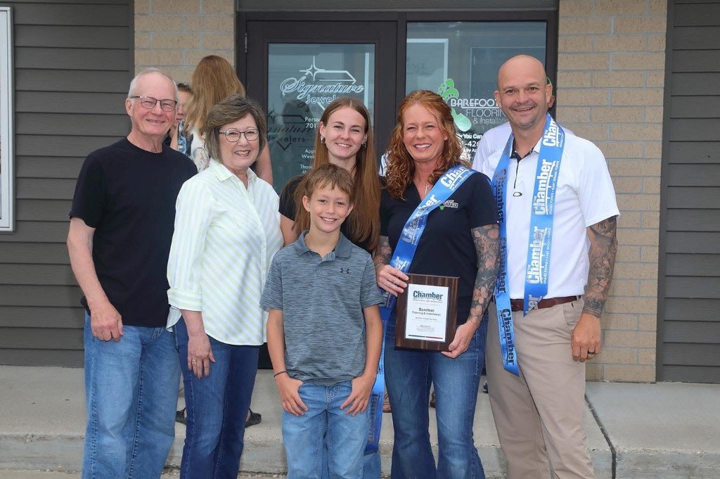 Barefoot Flooring family at the Grand Forks showroom